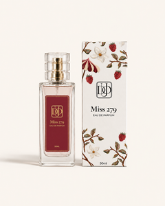 Perfume Miss 279, frasco e caixa em fotografia de estúdio sobre fundo marfim.